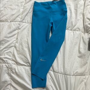 Nike women’s size  small Vibrant Blue Leggings dri fit
